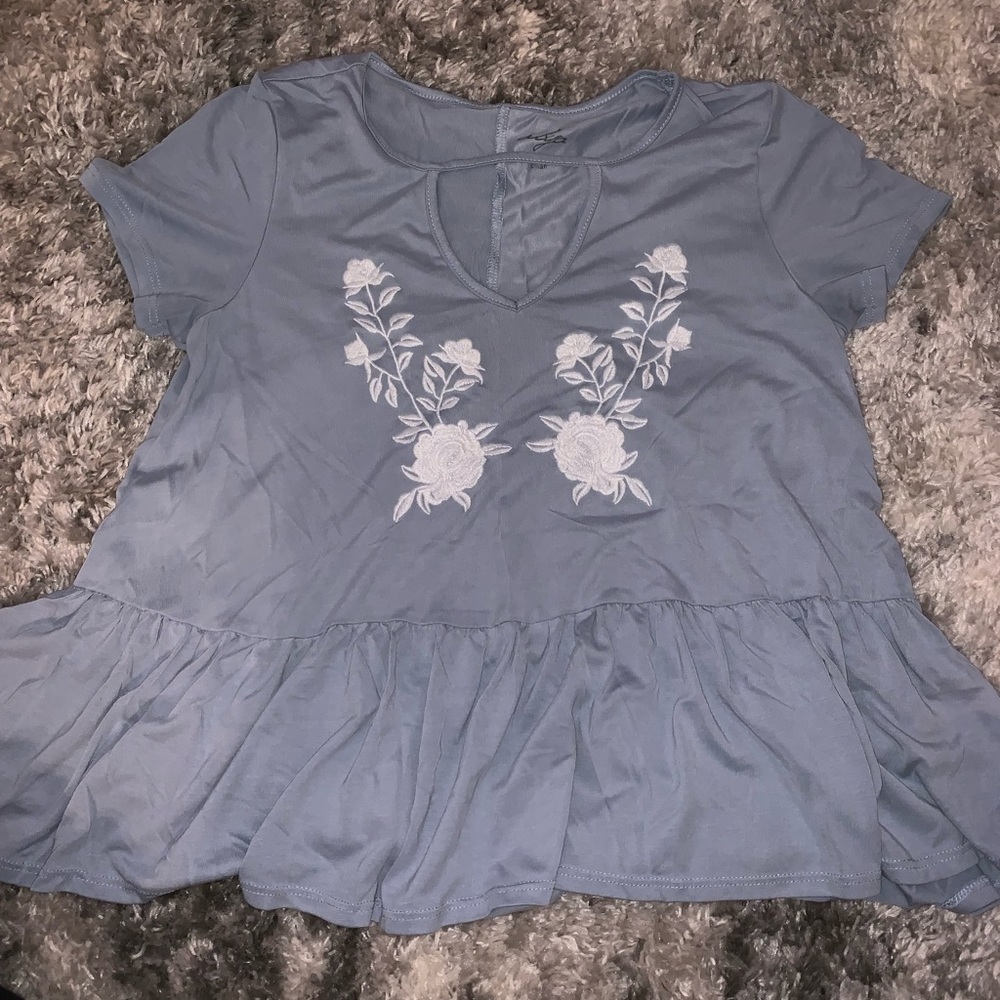 Blue peplum keyhole top